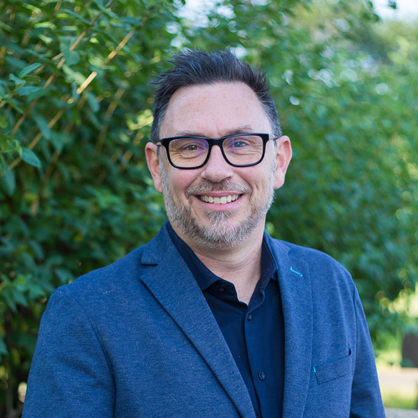 Headshot portrait of Michael Hennigar